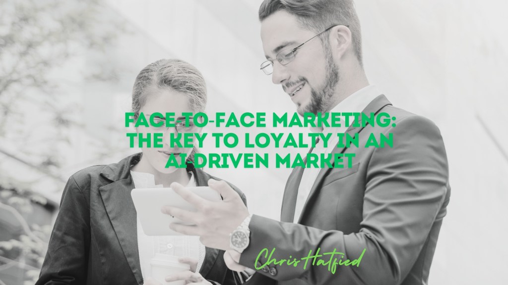 Business professional engaging face-to-face with clients to build trust and authenticity in a digital world