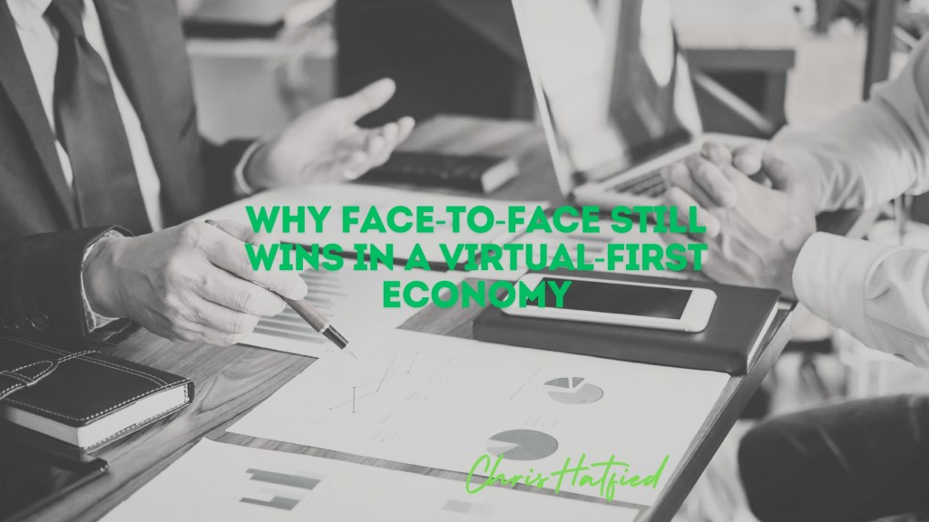 Business professionals meeting face-to-face to build trust and drive decisions in a virtual-first economy